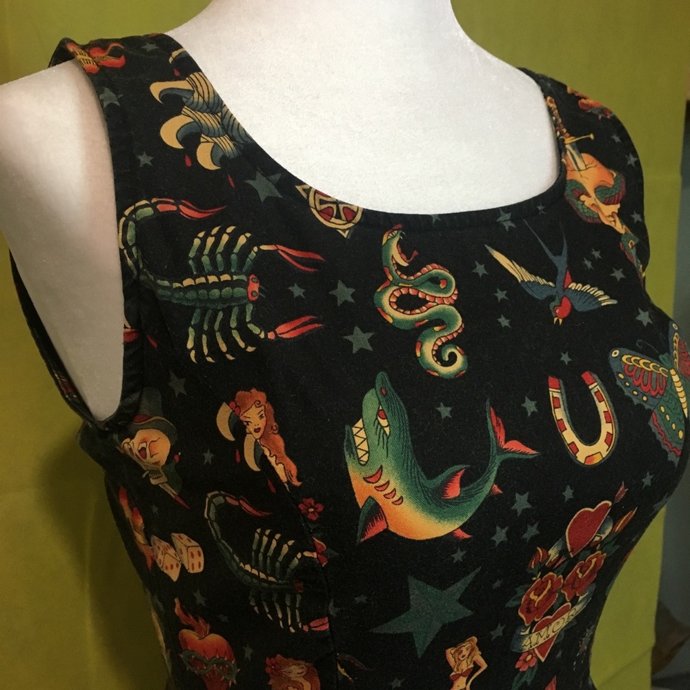 Hearts, daggers, skulls and amor dress.